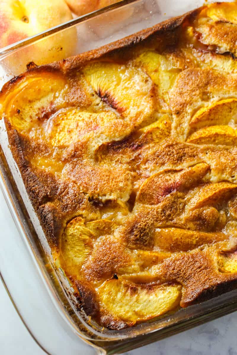 cooked Peach Cobbler in the casserole dish