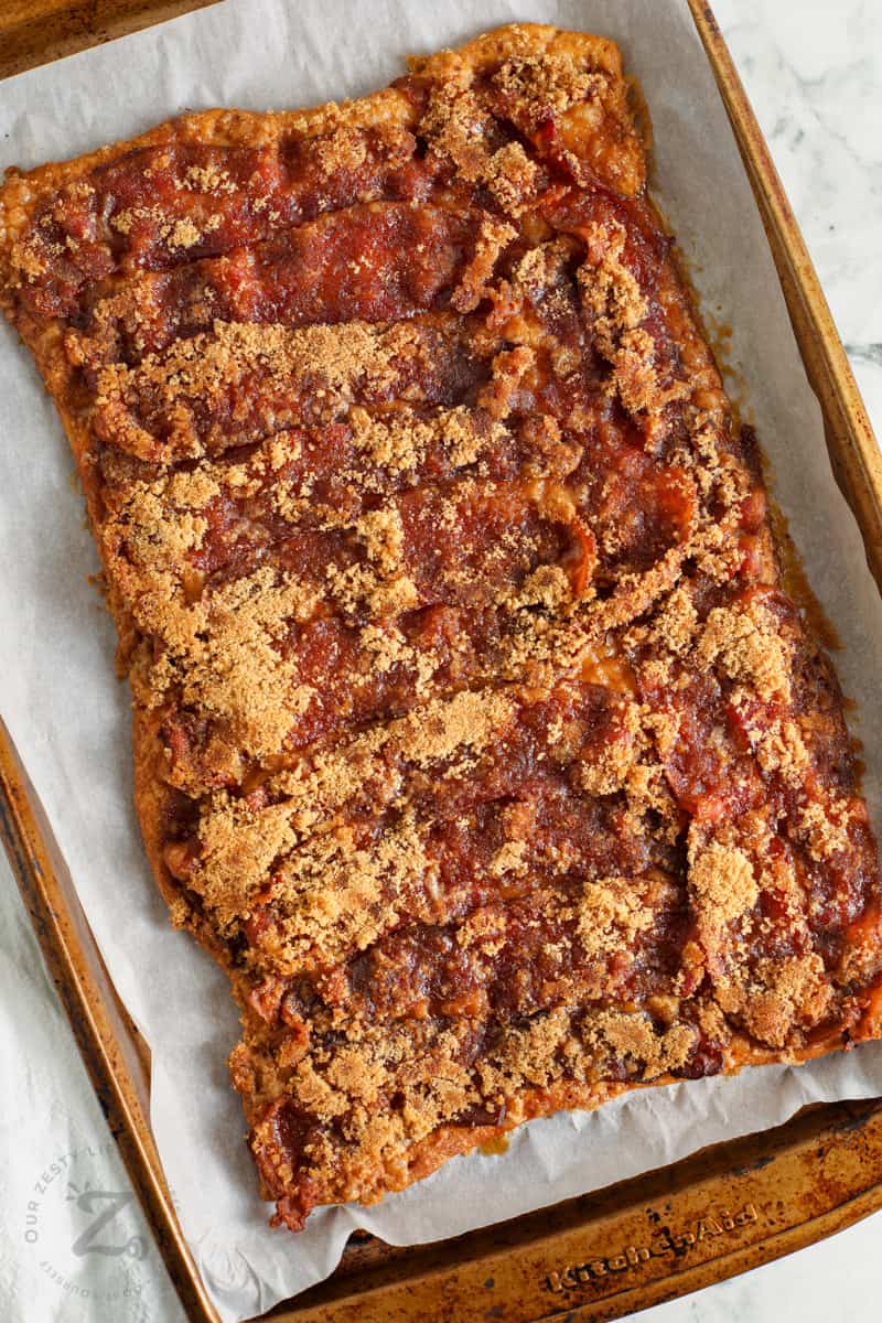 Baked Bacon Crack on a parchment lined baking sheet