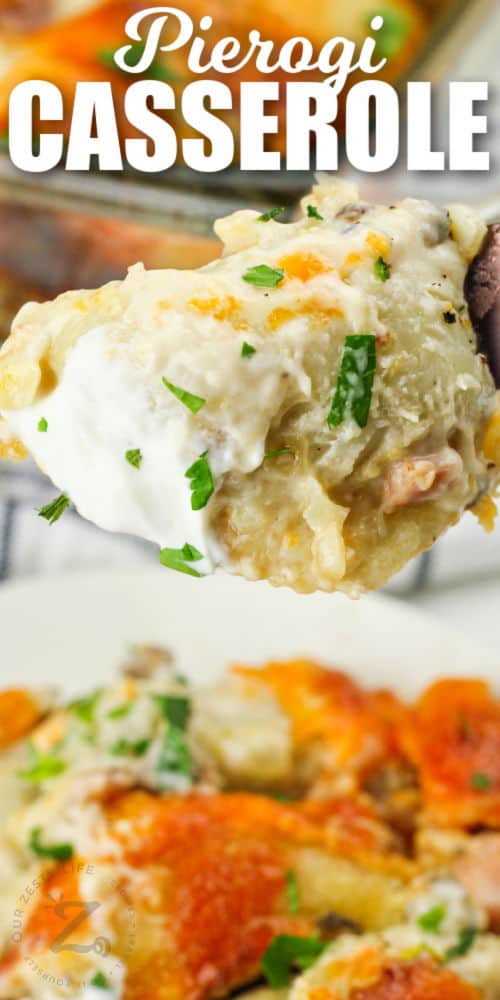 Pierogi Casserole on a fork with plate in the back and a title