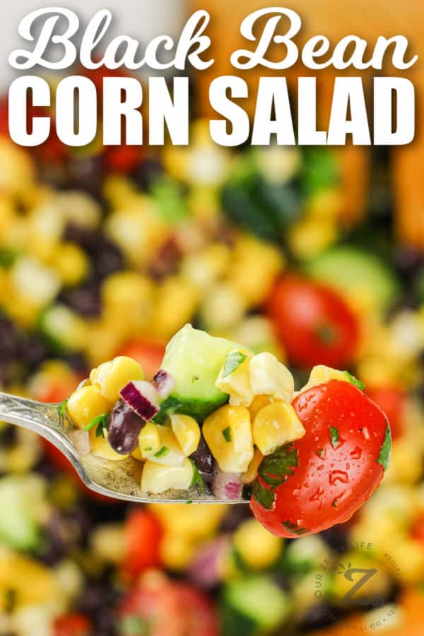 Black Bean Corn Salad on a fork with writing