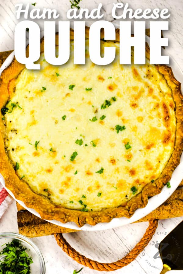 Quiche with Ham in a pie plate with writing