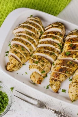 top view of sliced Air Fryer Chicken Breasts on a plate