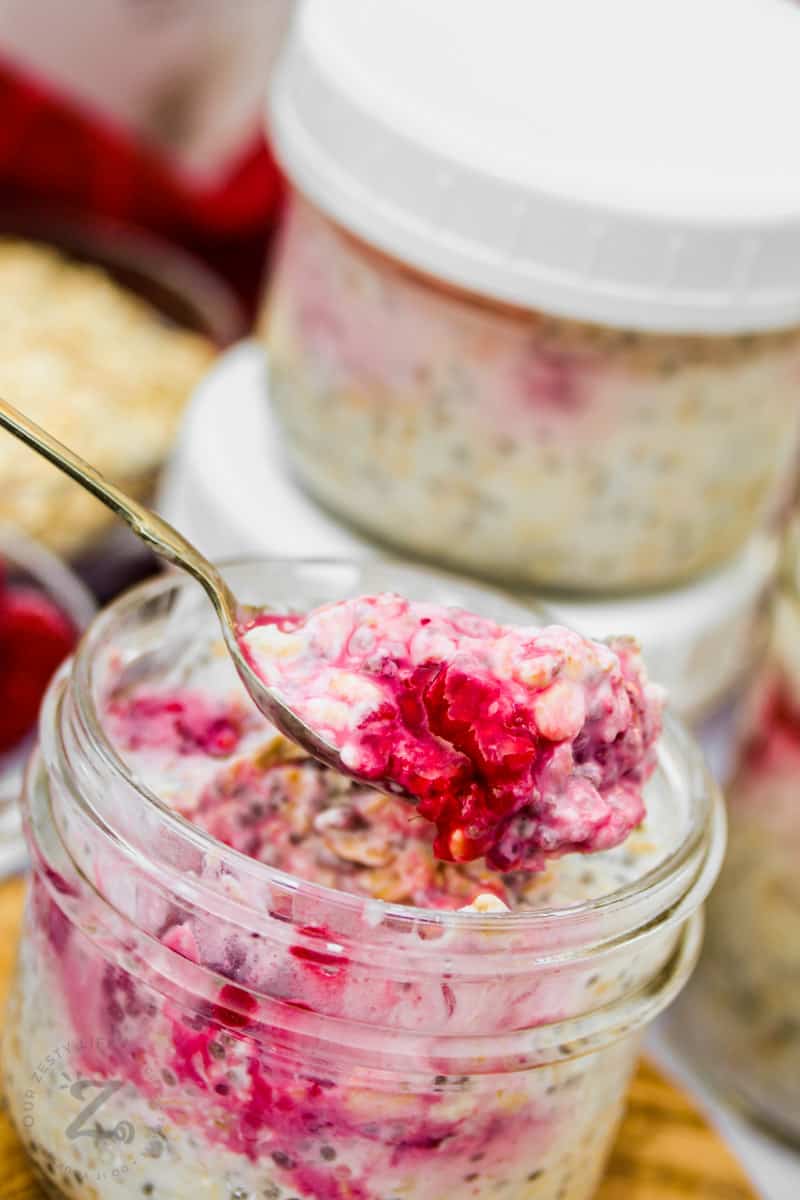 close up of spoon full of Overnight Oats with Fruit