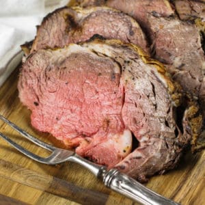slices of Reverse Sear Prime Rib with a fork