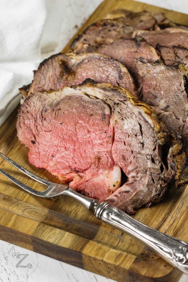 slices of Reverse Sear Prime Rib with a fork