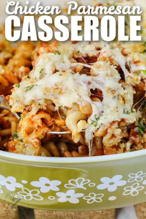 Chicken Parmesan Casserole in the casserole dish with writing