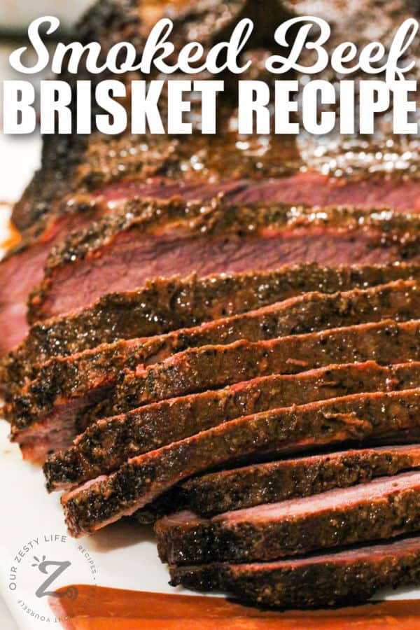 close up of sliced Smoked Brisket Recipe with writing