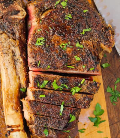 Tomahawk Ribeye Steak being cut into slices