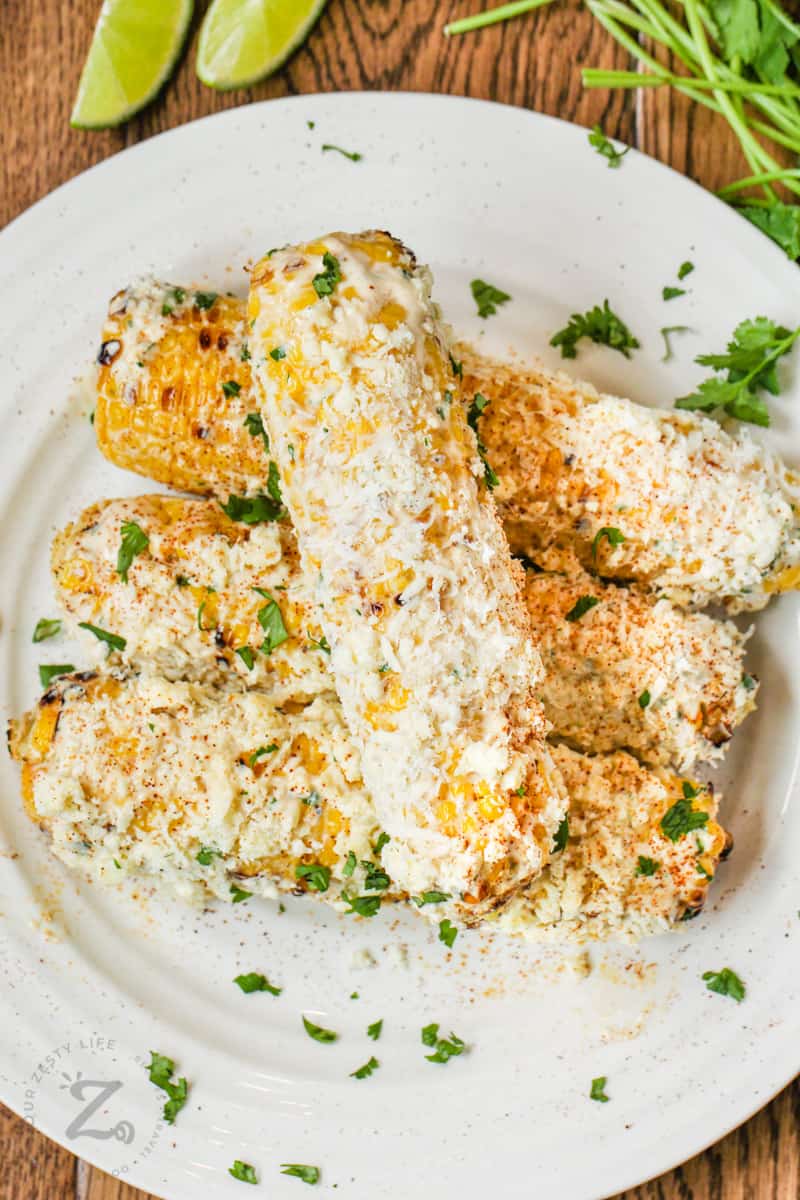 Mexican Street Corn on a plate with garnish