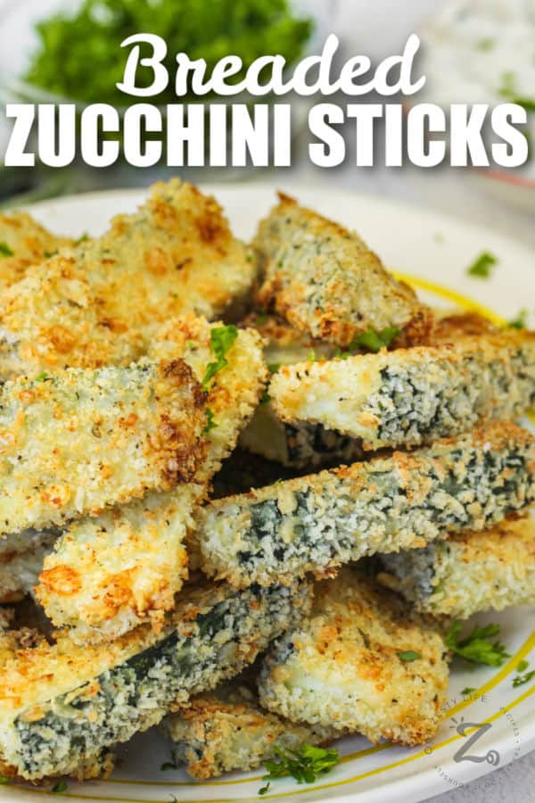 close up of Baked Zucchini Sticks with writing