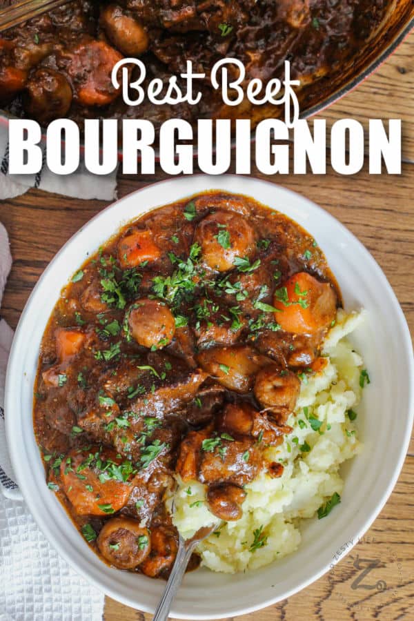 Beef Bourguignon in a bowl with writing