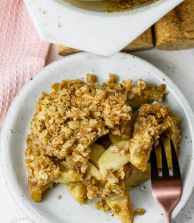 Apple Crisp Recipe on a plate with a fork