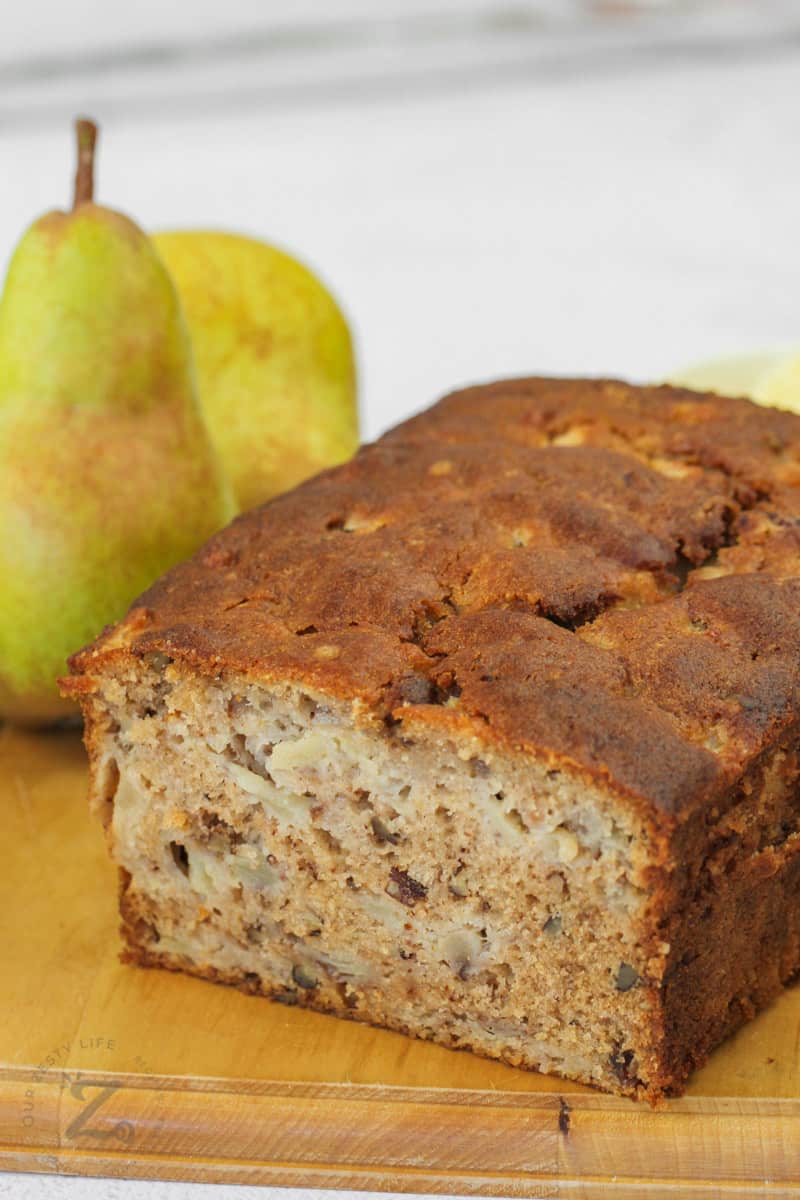 loaf of Fresh Pear Bread with pears beside it