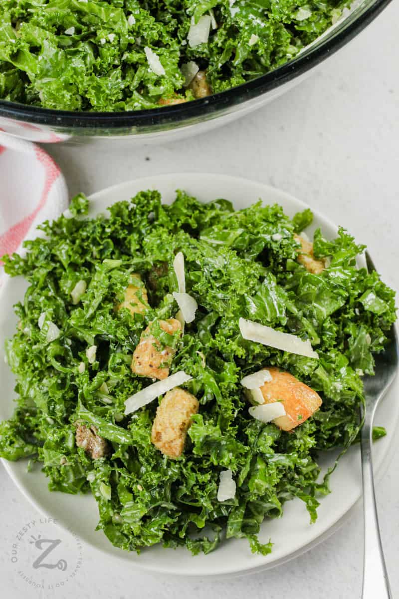plated Kale Caesar Salad with a spoon