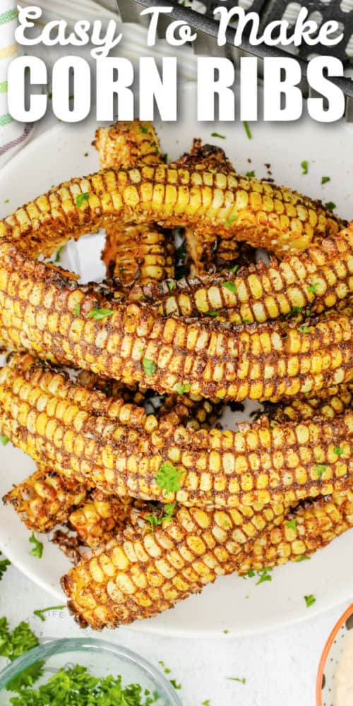 top view of Air Fryer Corn Ribs on a plate with writing