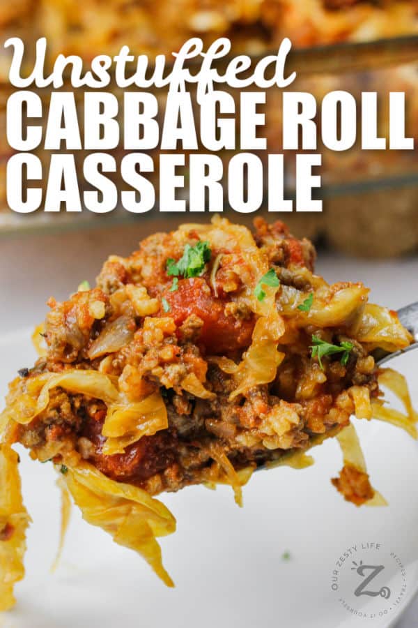 close up of Unstuffed Cabbage Roll Casserole on a spoon with a writing