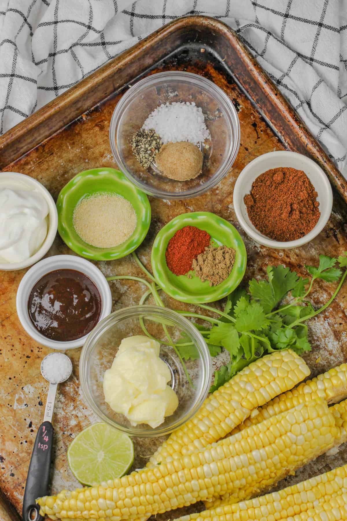 ingredients to make Baked Corn Ribs on a baking sheet