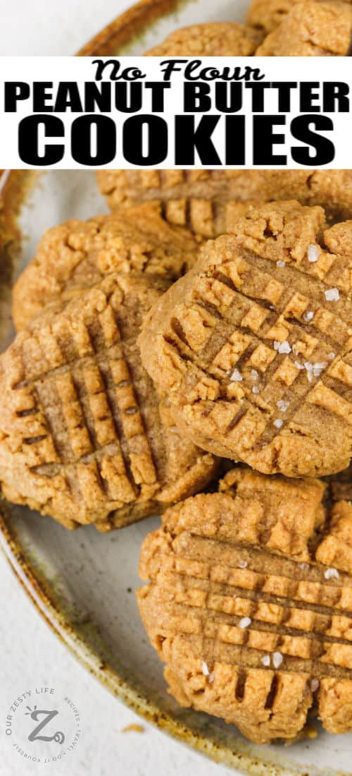 top view of Flourless Peanut Butter Cookies on a plate with writing