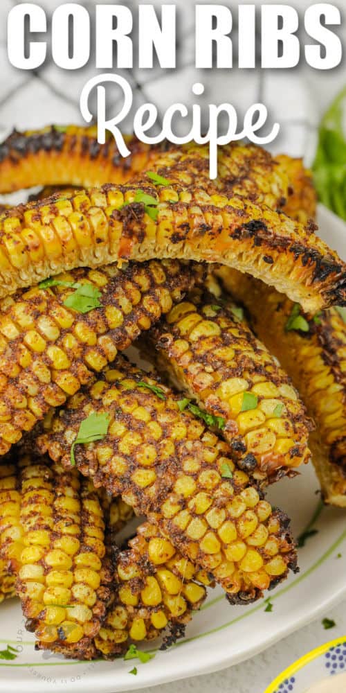close up of Baked Corn Ribs with a title