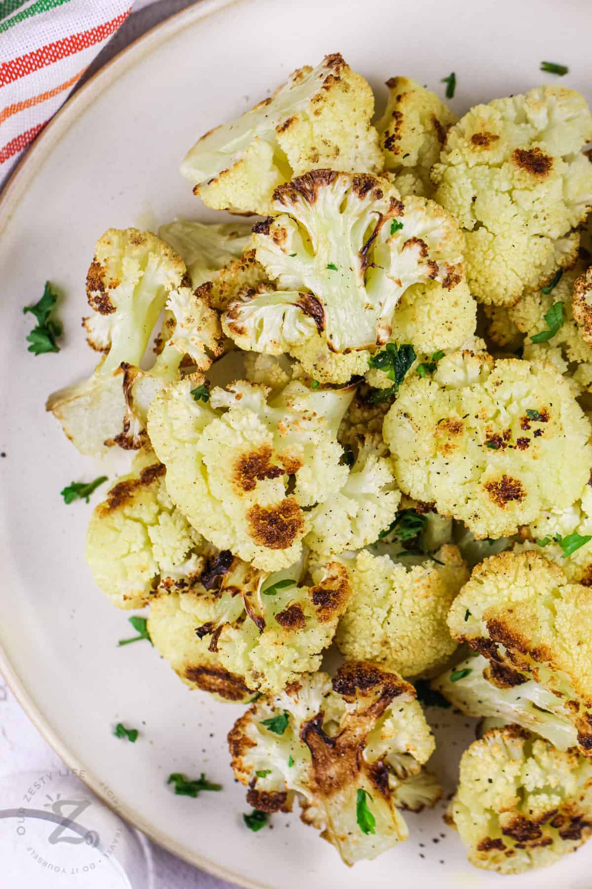 top view of Oven Roasted Cauliflower on a plate