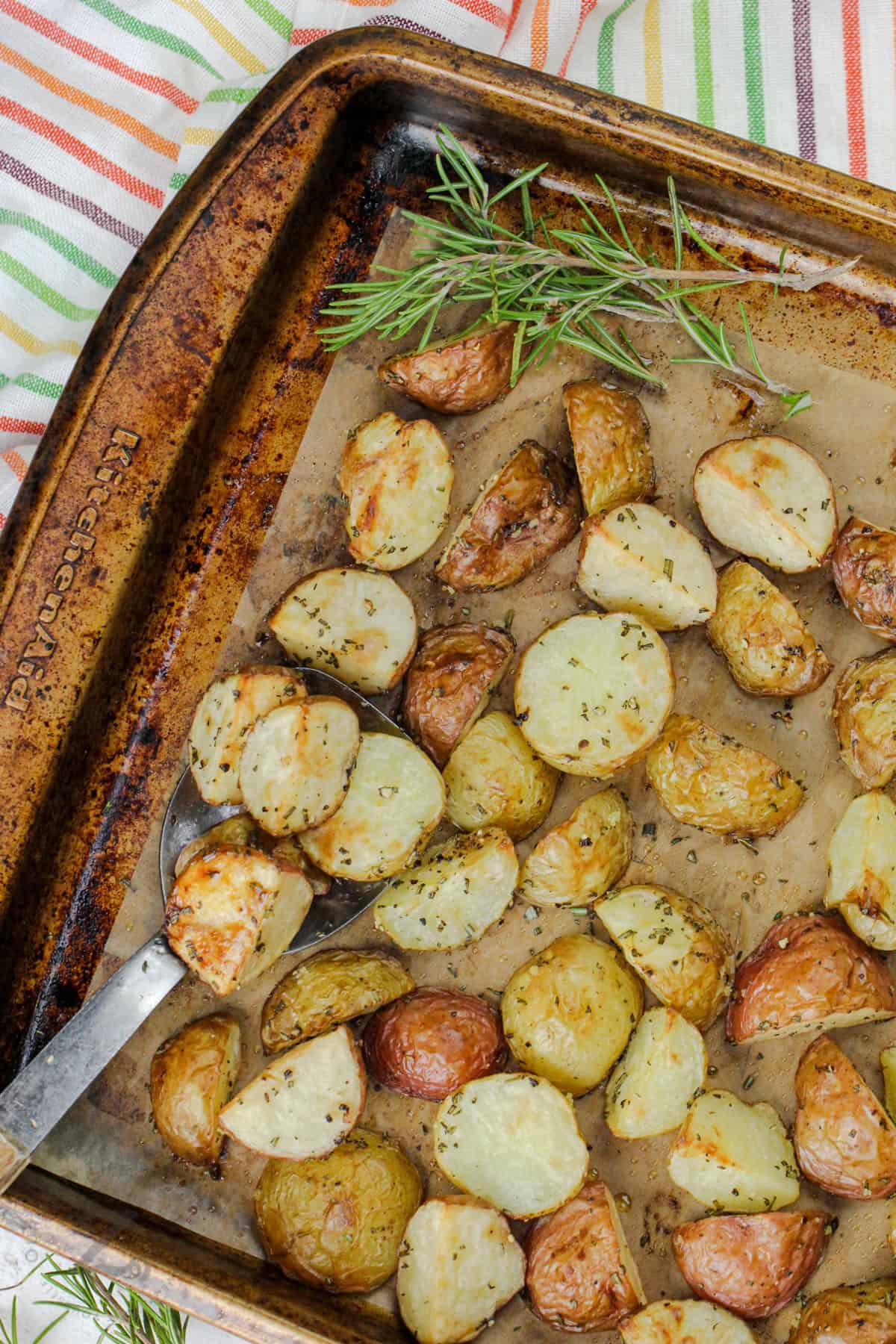 cooked Rosemary Potatoes on a baking sheet