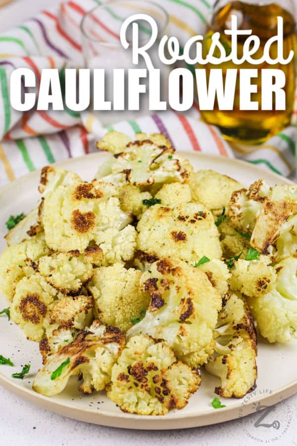 easy Oven Roasted Cauliflower and jar of oil with writing