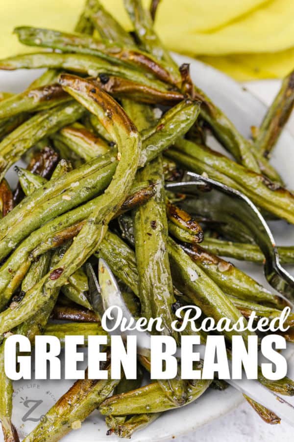 close up of Roasted Green Beans with writing