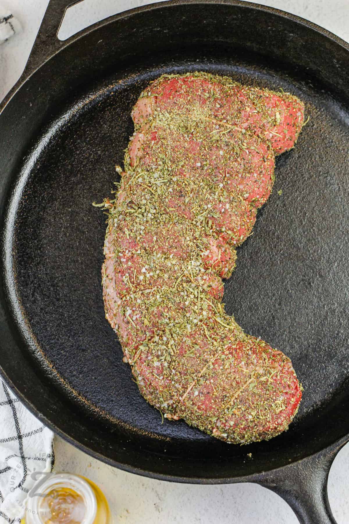 seasoned Beef Round Roast in a pan