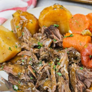 plated Instant Pot Pot Roast with a fork
