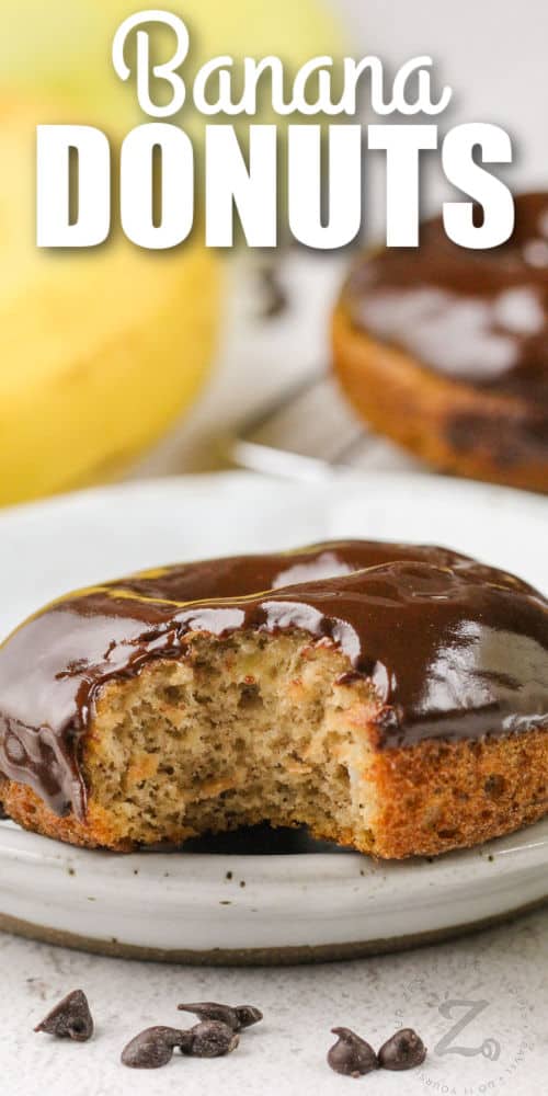 Banana Donuts with Chocolate Glaze with a bite taken out and writing