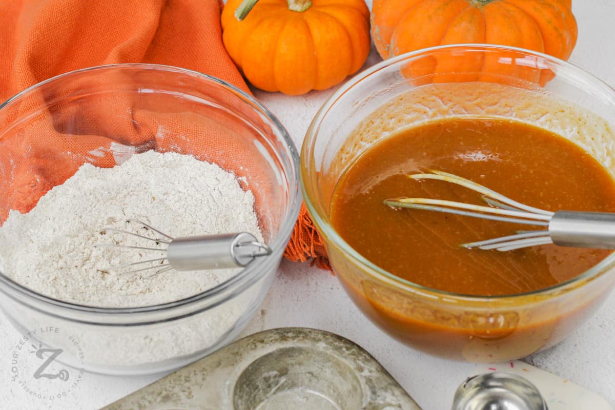 wet and dry ingredients in bowls to make Pumpkin Pie Muffins