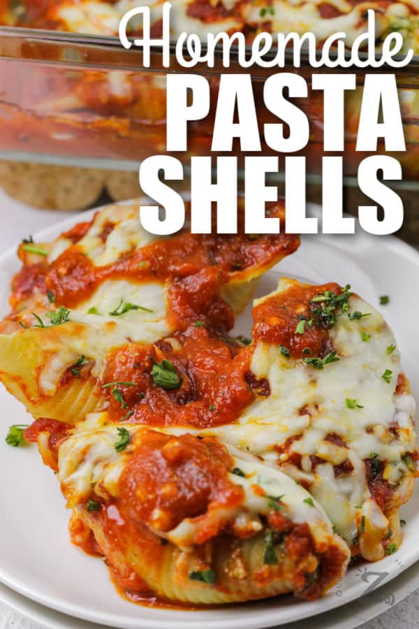 plated Classic Stuffed Shells with writing
