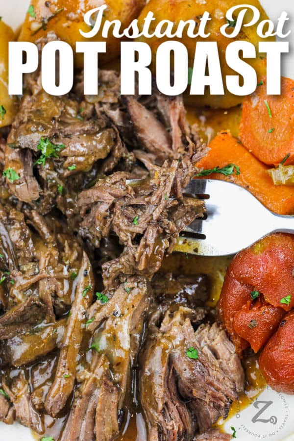 close up of Instant Pot Pot Roast on a fork with writing