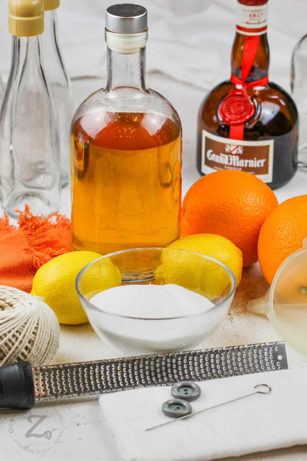 Homemade Grand Marnier ingredients and tools