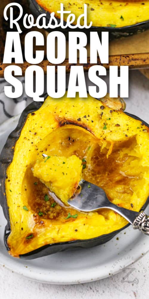 Roasted Acorn Squash with a fork full, with writing
