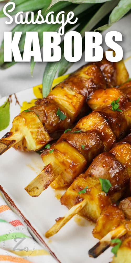 plated Sausage Pineapple Kabobs with writing