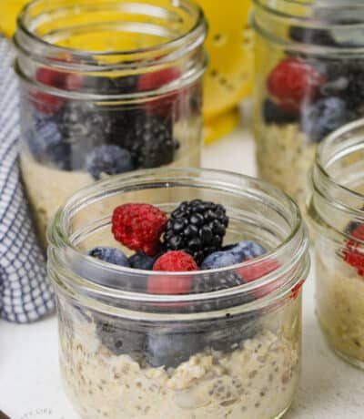 jars of Overnight Steel Cut Oats with berries