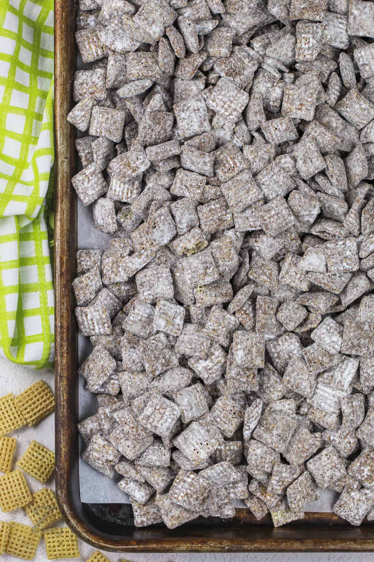 Puppy Chow on a baking sheet