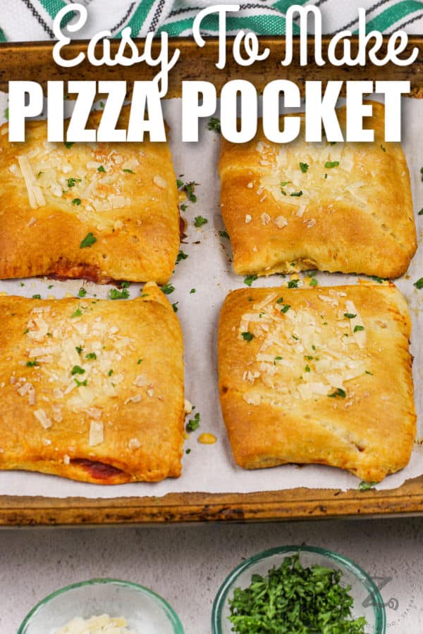 four cooked Easy Pizza Pocket Recipe on a baking sheet with writing