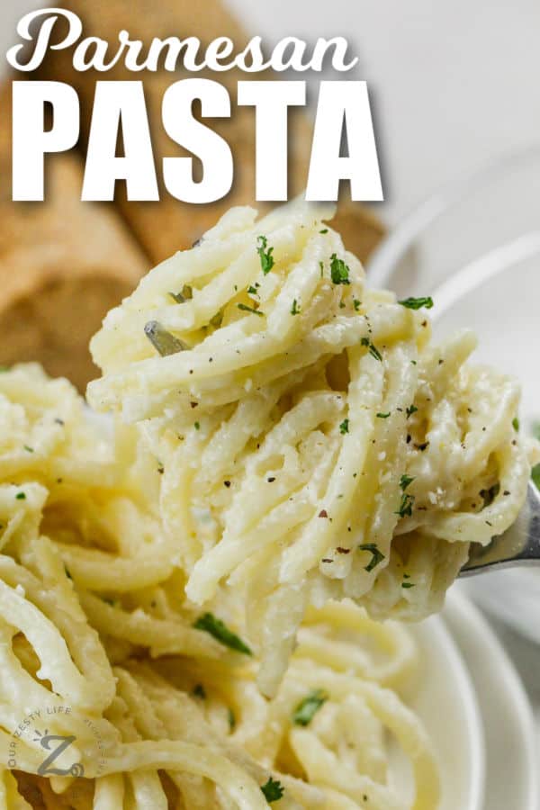 close up of Simple Lemon Parmesan Pasta on a fork with a title