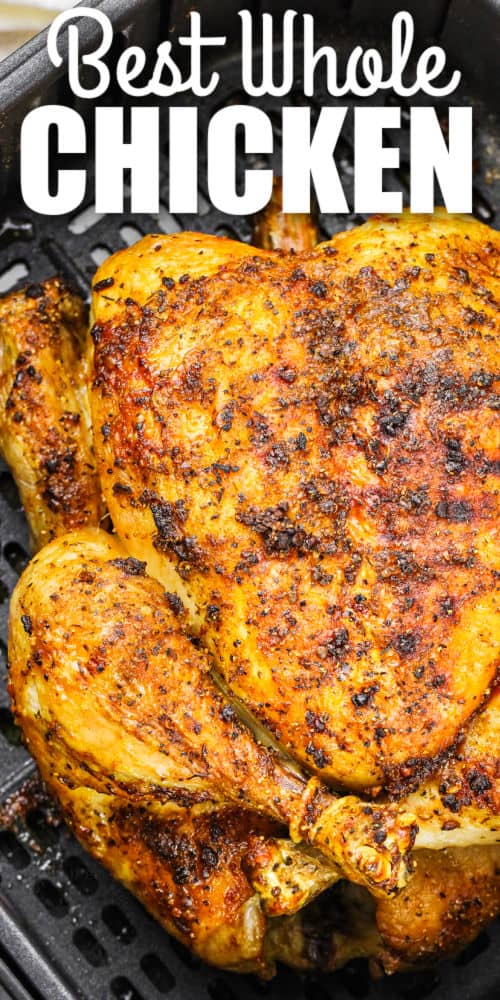 Air Fryer Whole Chicken in the fryer with writing