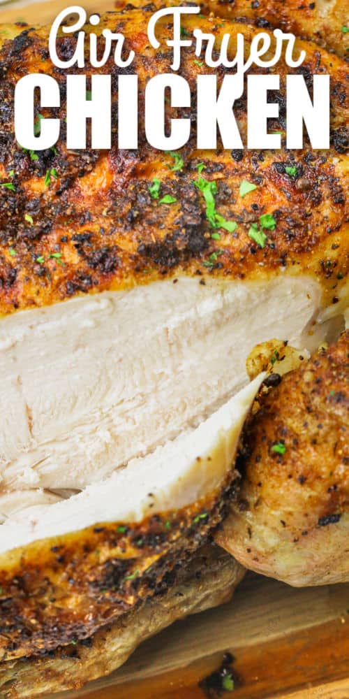 close up of sliced Air Fryer Whole Chicken with a title