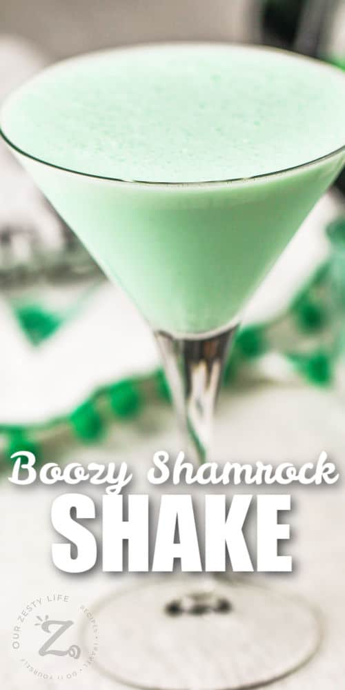 glass of Boozy Shamrock Shake with writing