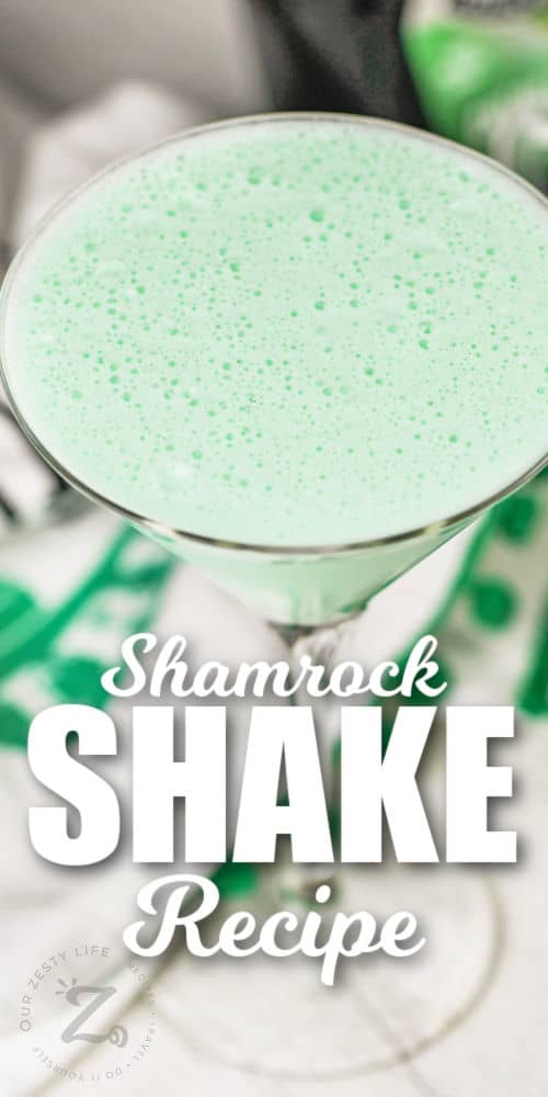 martini glass full of Boozy Shamrock Shake with a title