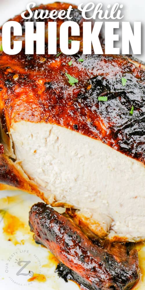 Sweet Chili Roasted Chicken, with a slice cut out of the breast, with a title