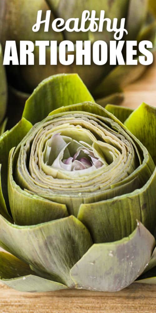 close up of cooked Artichokes with a title