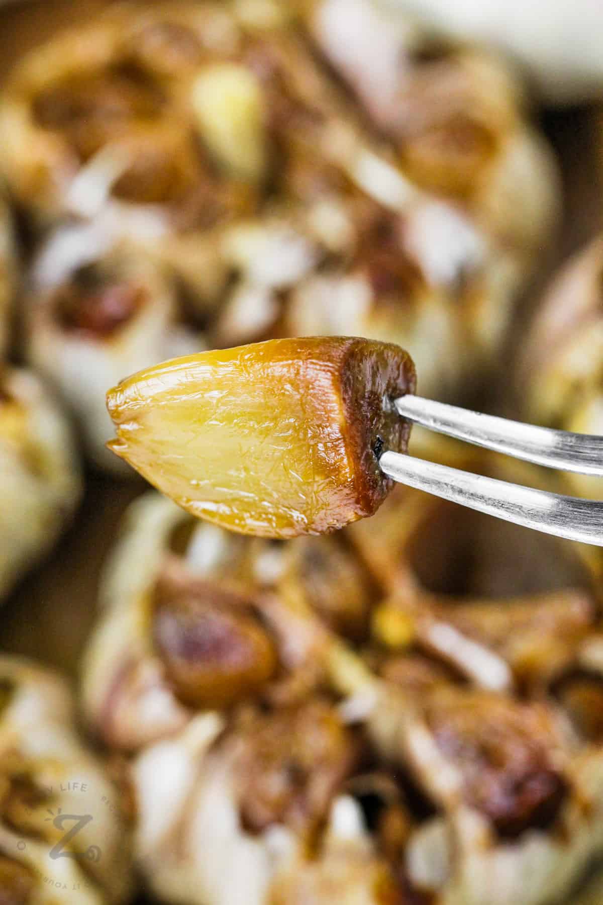 piece of Roasted Garlic on a fork