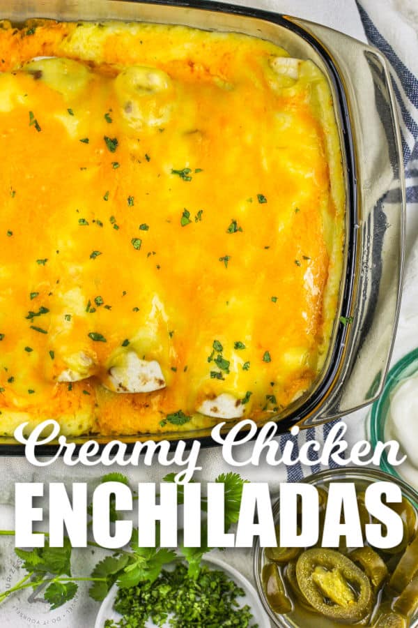 Creamy Chicken Enchiladas in a pan with writing
