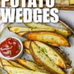 baked Potato Wedges on a plate with writing