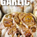 close up of cooked Roasted Garlic with writing